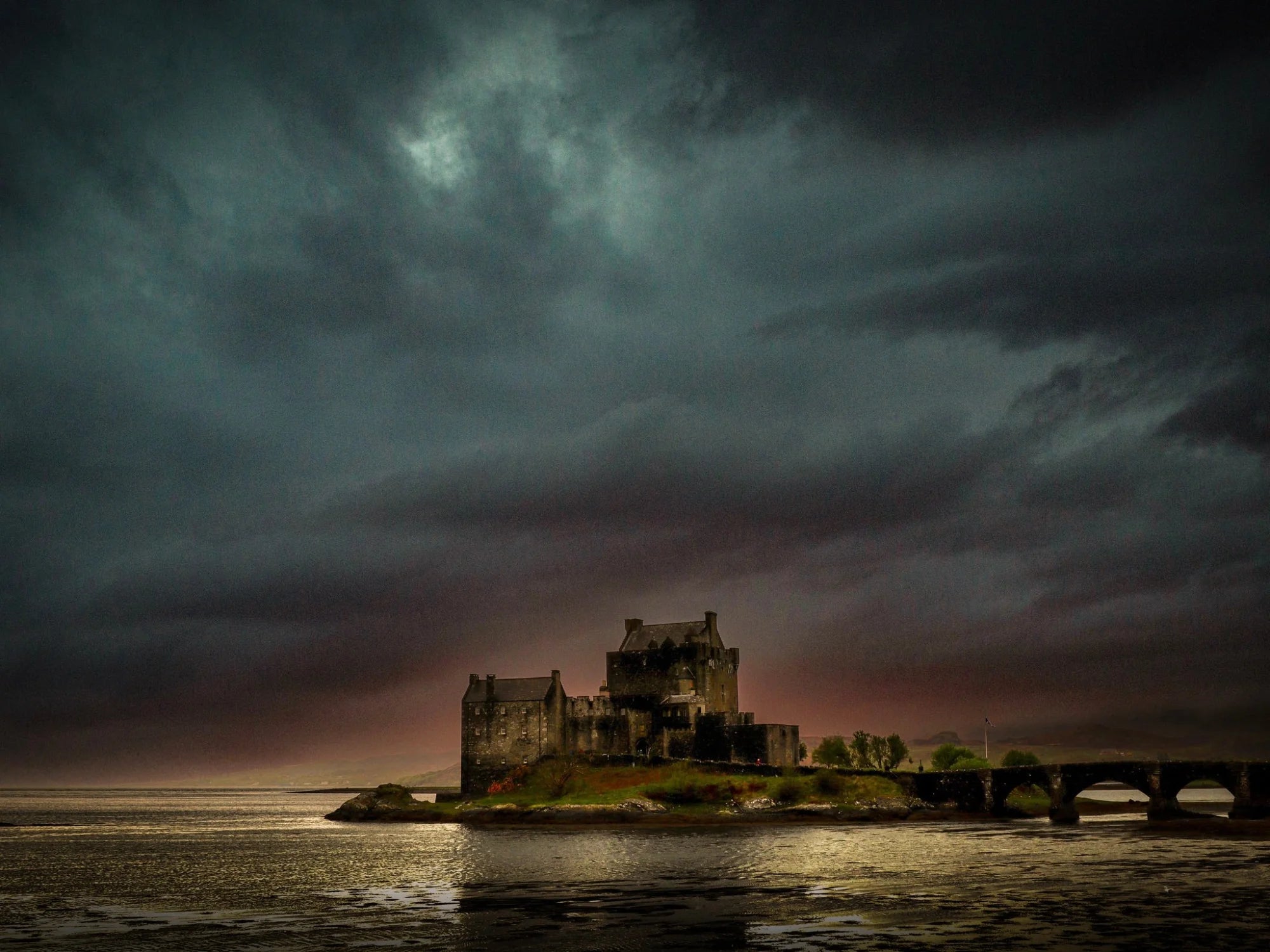 A Brooding Eilean Donan Castle | Photography Prints from Scotland - Historic & Iconic Art Gallery Worldwide Shipping Stormy Castle Island